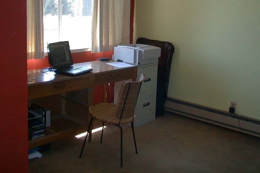 One of the earliest photos I could find of the HP LaserJet 6MP that I have used for over 16 years. Yes, that's a Ricochet wireless modem attached to my PowerBook G3 laptop.