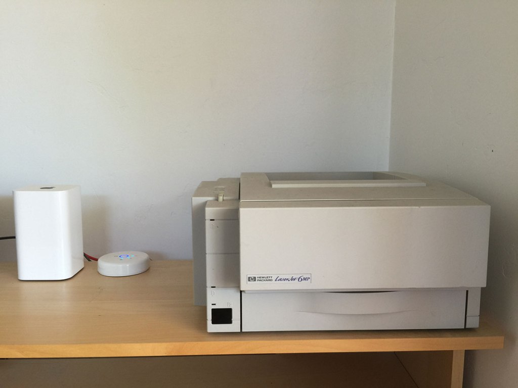 I was able to connect my HP LaserJet 6MP to my network using a Parallel Port-to-USB cable.