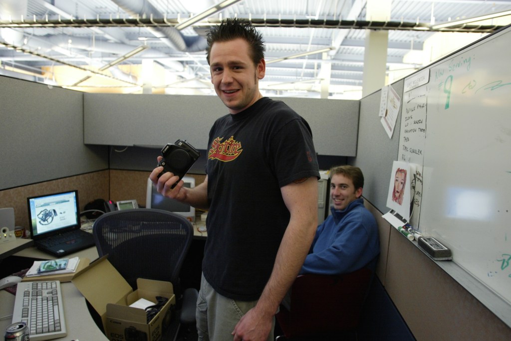 Meeting Alex King for the first time while selling my Canon EOS-D30 to his cube mate.