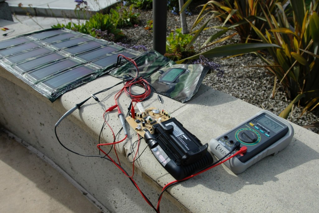 From 2002, a prototype solar powered battery charger for the Canon EOS 1D NP-E3 batteries.