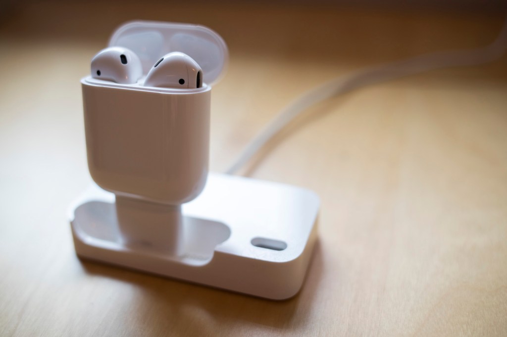A new use for the old original Apple Bluetooth Headset dock. With a 30-pin to Lightning adapter, the dock can now charge Apple’s next generation of Bluetooth headset, the AirPods.